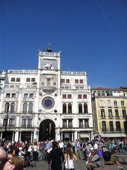 Photo of Plaza around St Mark's Basilica There are figures on the top of the clock that pound the large bell on the hour. Very old and still working great. , John E. M - October 2014
