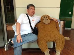 Photo of casual acquintance while waiting for the tour at the singapore flyer tourist hub, made friends with orang utan. , Allan D - May 2014