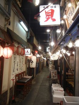 Photo of Alleyway of tiny eateries Never would have found a place like this. We ate around the corner, on wobbly benches outside a tiny restaurant and it was delicious and so much fun. , Carol B - June 2016