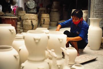 Bat Trang Pottery ancient village by motorbike