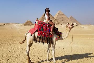 Desert safari at Giza Pyramids with Quad Bike and camel Riding during sunset