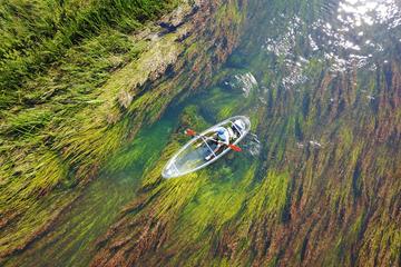 Transparent kayaks on river Gacka