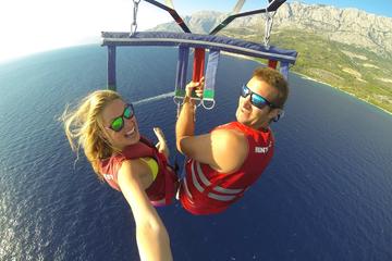 Four Adventures: Parasailing, Sharks and Stingray, Catamaran Cruise and Snorkeling from Punta Cana