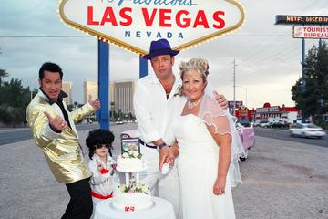 Pink Cadillac Wedding or Vow Renewal Ceremony at the Las Vegas Sign with Elvis