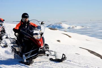 Half-Day Snowmobile Safari including Lunch in Helsinki Archipelago