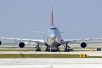 Traslado de ida y vuelta desde el Aeropuerto Internacional de...