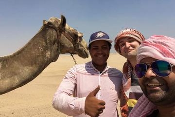 Full day in Giza pyramids with riding camel wearing Arab traditional dress head