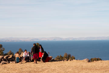 Kayak to Uros and continue by boat to Amantani and Taquile 2d1n