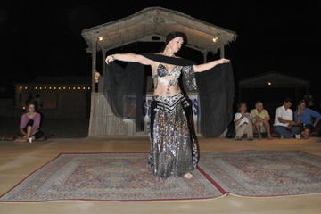 Private Overnight Safari: Sandboarding, Camel Ride, BBQ Dinner and Belly Dancing