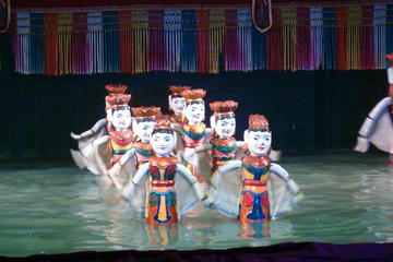Enjoy Vietnamese Folk Performing Arts & Water Puppet Show (within REX HOTEL)