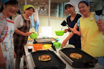 Experience Tokyo through Walking and Okonomiyaki
