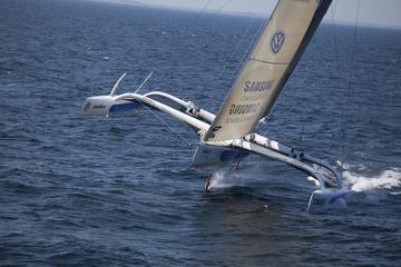 Trimaran Sailing in Caldera