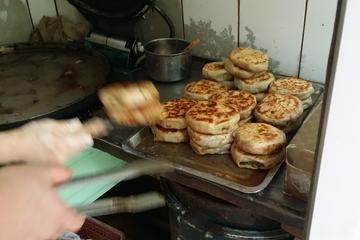 Small Group 4-Hour Gourmet Beijing Foodie Tour on Bike