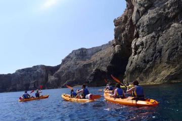 Kayaking-caves trip with snorkelling in the marine reserve of Menorca