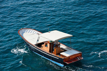 Amalfi Coast private tour by traditional and elegant wooden boats