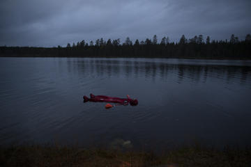 Ice-Floating Under the Northern Lights in Rovaniemi