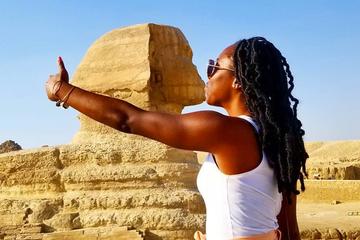 Day tour to the pyramids the Sphinx the valley Temple and papyrus Center