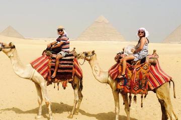 2 hours have fun Camel ride excursion by pyramids and have funny photos depend on ur request time from Cairo Giza hotels