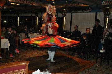 an invitation to dinner show on Nile river at night
