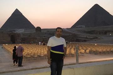 Pyramids sphinx and light show at night