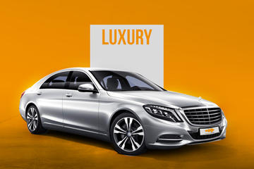 Private Arrival Transfer: Amsterdam Airport to Amsterdam City Center in Luxury Sedan