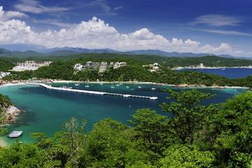 Huatulco Bay Day Trip with Catamaran Ride, Snorkeling and Beach Break from Puerto Escondido