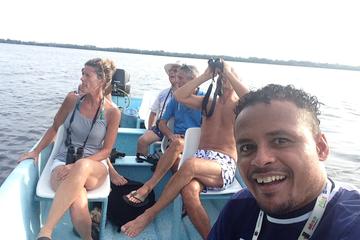 SUN RISING IN MANIALTEPEC LAGOON BIRDWATCHING SUNSET AND BIOLUMINISCENT LIGHTS