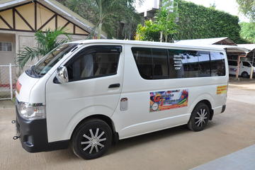Exclusive van from port barton or san vicente to puerto princesa airport