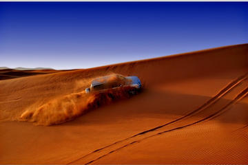 Dubai Desert Red Dune Half-Day Adventure with Dune Bash and BBQ Dinner