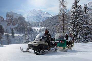 Snowmobile & Sledding and The Great Dolomites Road Private Tour by car