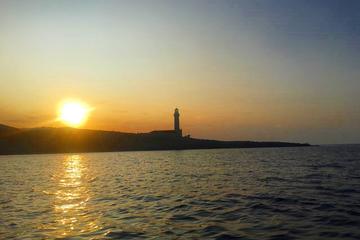 Sailing at sunset to Stoncica lighthouse alongside the coast of the island of Vis