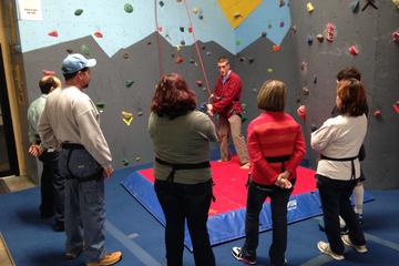 Person giving bouldering lessons