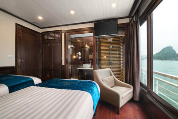 HALONG ALISA 5 STAR CRUISE VISITING AND KAYAKING ON PEACEFUL BEACHES AND CAVES