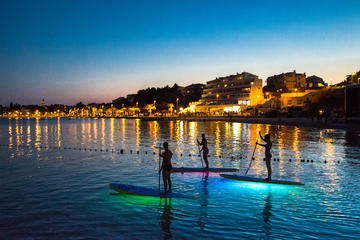 Stand Up Paddleboarding Glow tour in Stobrec