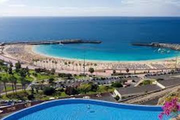 Day Pass at Gloria Amadores: Spa, Lunch and Infinity Pool Access