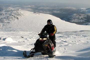 Snowmobile tour to Narodnaya Mountain