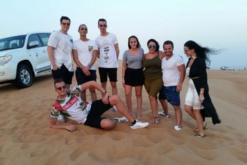 Dubai Half Day Desert Safari Tour with Quad Bike, Camel Ride & BBQ Dinner
