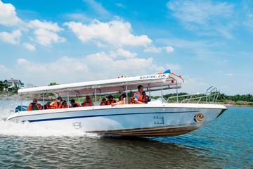 Half-Day Cu Chi Tunnels by Speedboat equipped with Wireless Headset Guide System