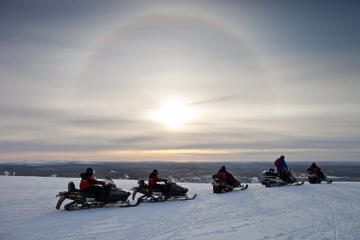 Lapland Wilderness Snowmobile Safari from Saariselkä with Ice Fishing and Snowshoeing