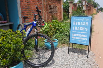 Half-day Small-Group Siem Reap Bike Tour: NGOs, Rice Wine, African Pouched Rats