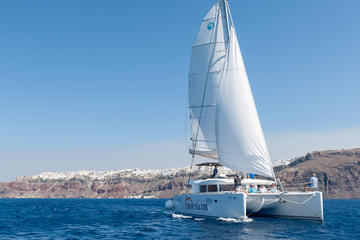 Santorini Small-Group Catamaran Sailing Trip with BBQ and Drinks