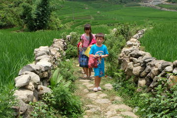 Remote biking to Riverside Lodge in Red Dao village