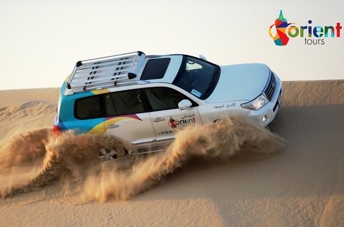 Safari nel deserto di Dubai in 4x4 con traversata delle dune, sandboarding, giro su cammello e cena